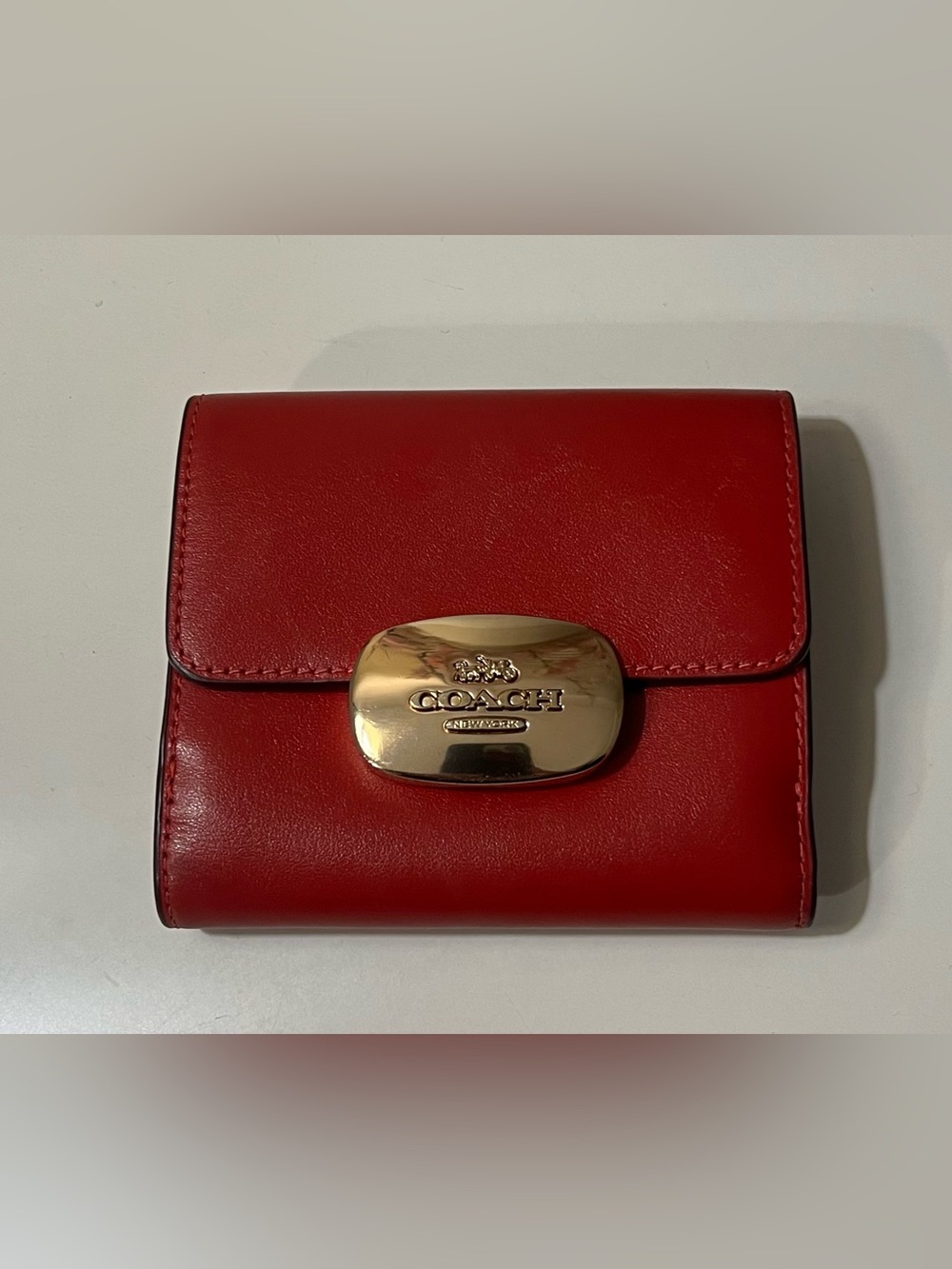 Coach Red Leather Compact Wallet with Polished Gold Plaque
